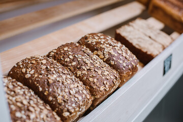 Fresh crispy bread on a store shelves or bakery