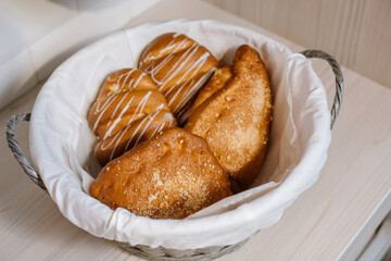 Fresh crunchy buns in basket