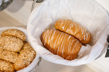 Fresh crunchy buns in basket