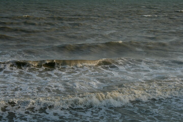 waves and sand on the beach