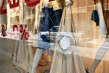 Greece, Athens, June 28 2020 - Broken glass of store window at Ermou street, in the commercial center of Athens, after vandalism made by anarchists.