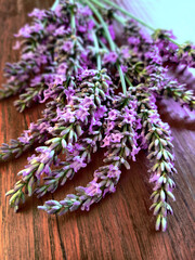 Lavender branches on the wooden table.