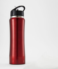 Full length red aluminium waterbottle. Isolated on white background.