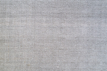 Fototapeta na wymiar Texture of old homespun linen fabric. Rough textile