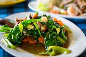 stir fried kale with crispy pork