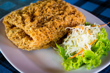 Crispy catfish salad with green mango