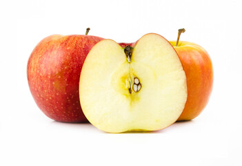A set of two whole and one half apples. Composition of three apples isolated on a white background. Template. Fruits. Cut.