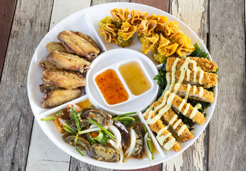 Thai-style Hors d'oeuvres on white dish