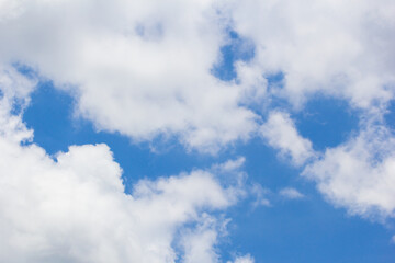 Fantastic soft white clouds against blue sky