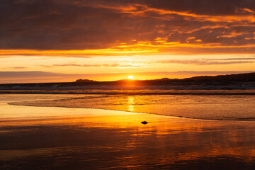 Sunset on the beach at White Rocks, Causeway Coast, Northern Ireland