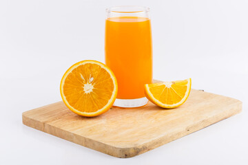 Orange juice and slices of orange on white background