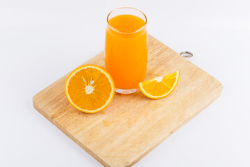 Orange juice and slices of orange on white background