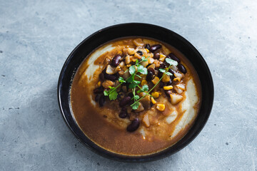 plant-based food, vegan mash potato and gravy with beans and veggie sausage
