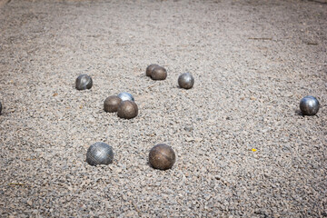 Petanque ball boules bawls on a dust floor