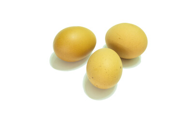 three eggs on white background