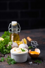 Obraz na płótnie Canvas Homemade mayonnaise sauce with ingredient