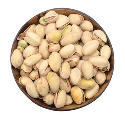 Heap of pistachios nuts in wood bowl isolated om the white