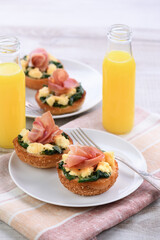 Breakfast. Bun with cheese, spinach, ham