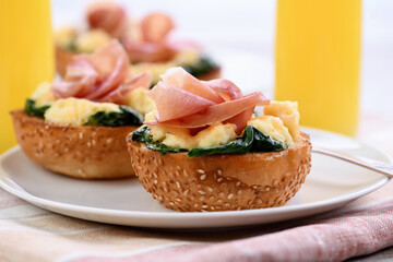 Breakfast. Bun with cheese, spinach, ham