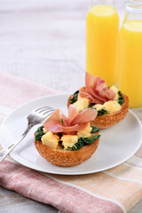 Breakfast. Bun with cheese, spinach, ham