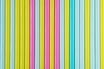 Obraz premium colored tubes for cocktails for a party, pattern