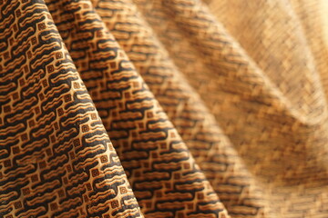 Batik Indonesian with various pattern. Batik is made either by drawing dots and lines.