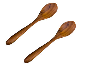 Wooden spoon on white background