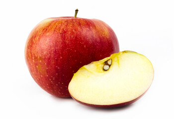 A set of one whole apple and a quarter. Composition of two apples isolated on a white background. Template. Fruits. Cut. Part.
