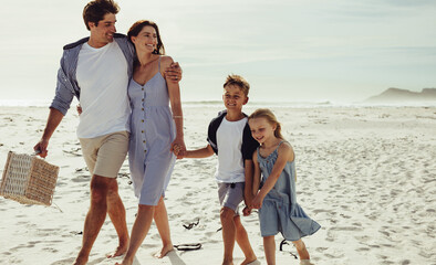 Family at beach for a picnic