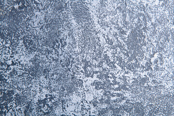 blue cold wall background in a living room with a building plaster surface