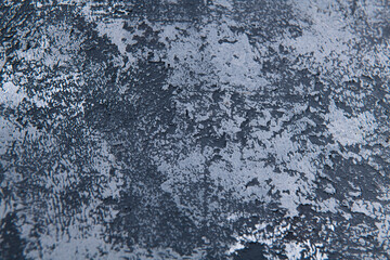 blue cold wall background in a living room with a building plaster surface