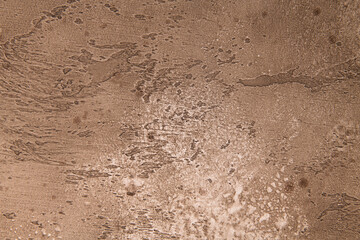 warm brown chocolate background from water-based building plaster