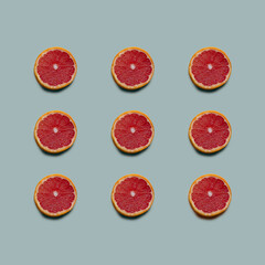 Grapefruit pattern on pastel background. Fresh fruit. Grapefruit isolated on pastel background.