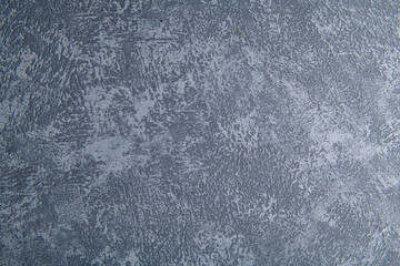cold bluish smooth background of building plaster applied to a wooden base