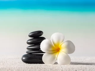 Foto op Canvas Stack of zen stones on sand beach © PRASERT