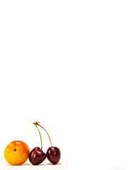 nectarine and cherry on a white background (fruits)