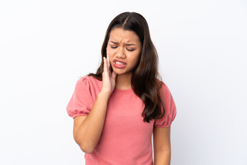 Fototapeta premium Young Colombian girl over isolated white background with toothache