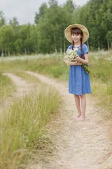 Poster summer portrait of adorable girl with chamomiles bunch © Albert Ziganshin
