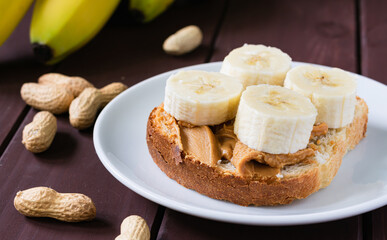fast food, snack, peanut butter and banana sandwich on the table