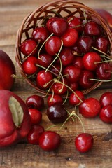 Juicy nectarines and cherries on the table