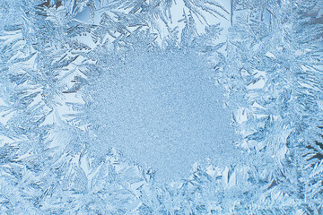 Winter background, frost on window. Frosted glass with patterns