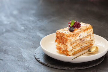 Puff pastry napoleon cake with vanilla cream and berries