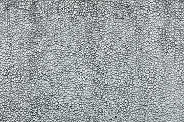 Many pebbles on floor or on wall as background texture