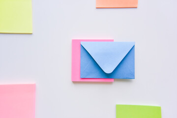 selective focus, blue envelope in the center with colored rectangles on sides