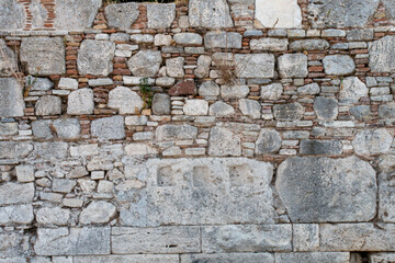 pattern gray color of modern style design decorative uneven cracked real stone wall surface with cement