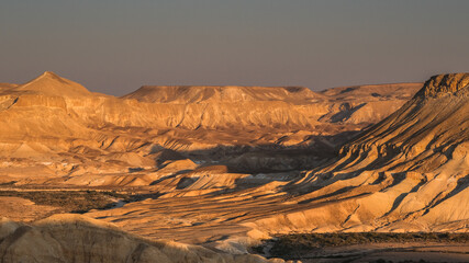 Naklejka premium View of Nahal Zin, a 120 km long intermittent stream, the largest canyon in country, as seen at sunset from Sde Boker field school, Negev desert, Israel.