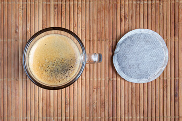 Coffee cup with coffee capsule