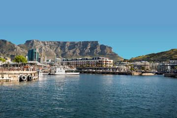 Table Mountain and Cape Town waterfront with blue sky