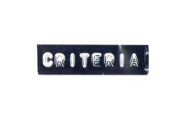 Embossed letter in word criteria on black banner with white background