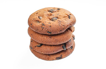 Delicious chip cookies isolated on white background. Stack of dark chocolate treats